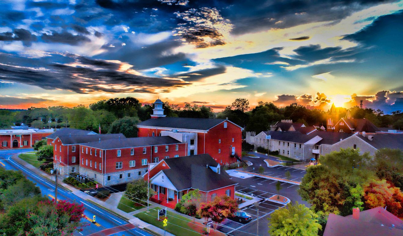Solia Media is FAA Certified. Drone Shot of Rockdale County Government Buildings at sunset - Olde Town Conyers